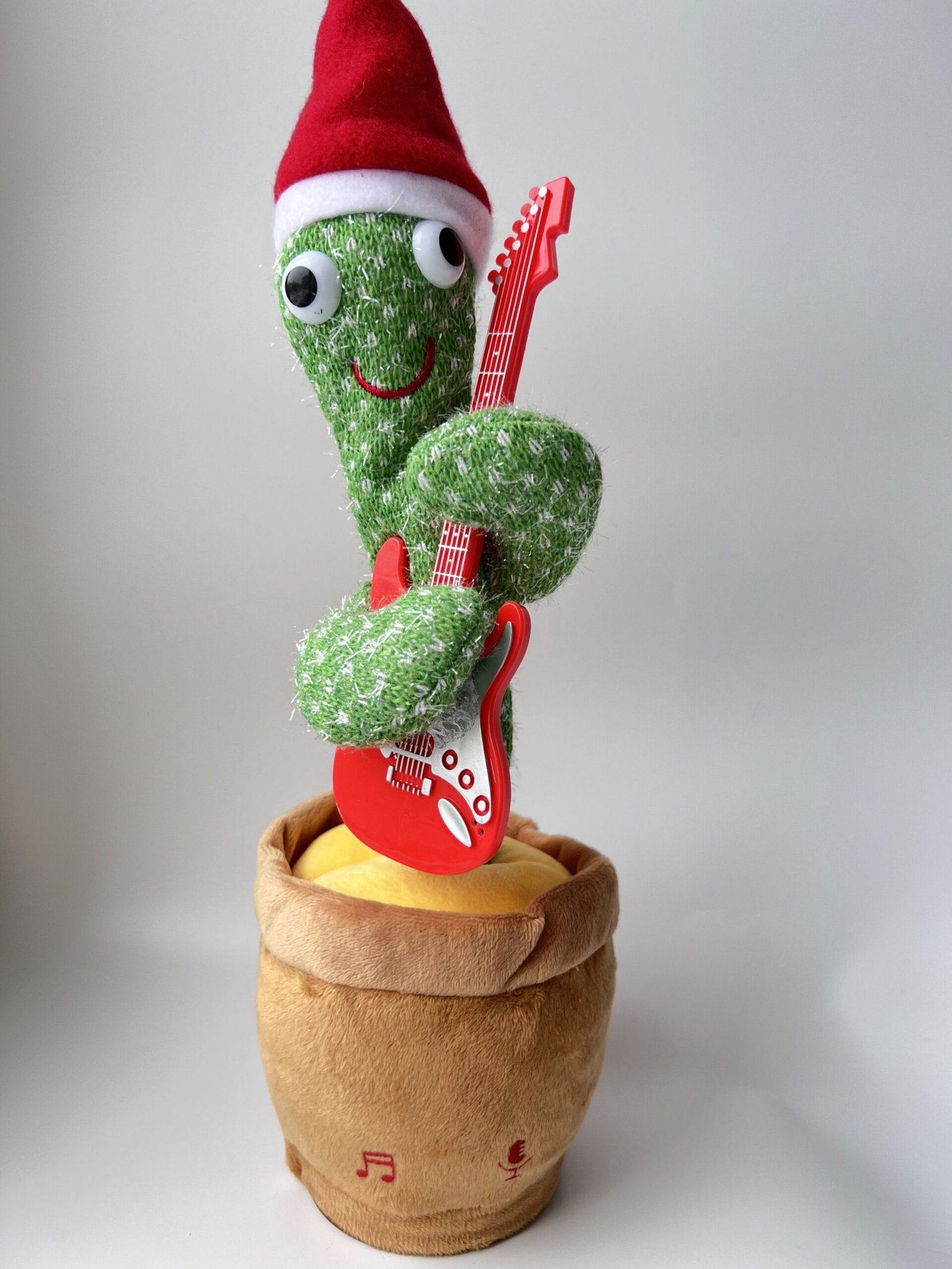 img_6404-rotated-1.jpg М'яка інтерактивна іграшка Танцюючий кактус з гітарою повторює слова і співає зелена - Зображення 1
